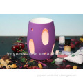 purple and white ceramic decorative oil burner
